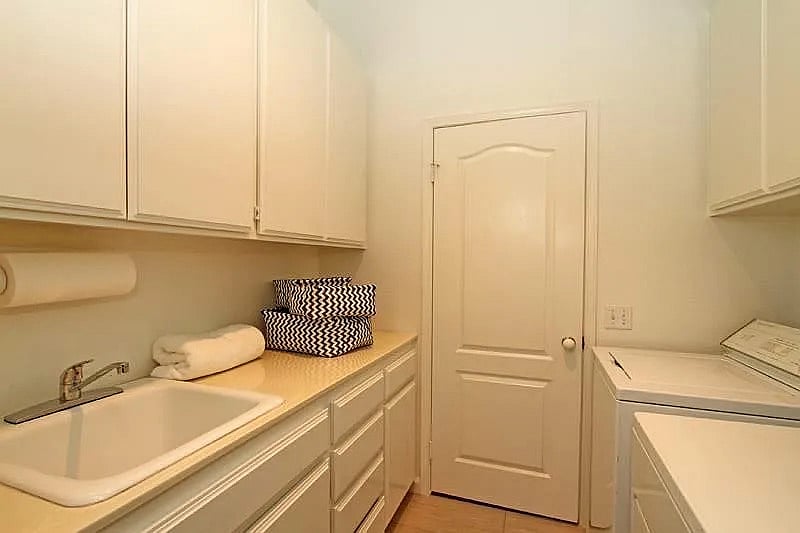 A full-size washer, dryer, and utility sink  because packing light is so much easier when laundry is on-site