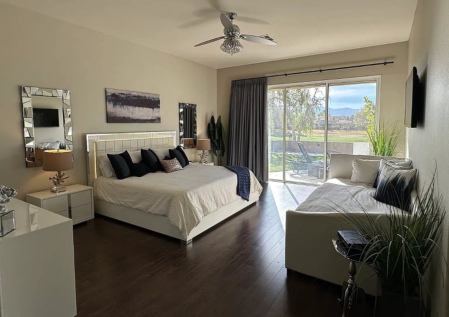 Drift off in the luxurious king-size master suite with two twin trundle daybed and a private golf course view and direct patio access