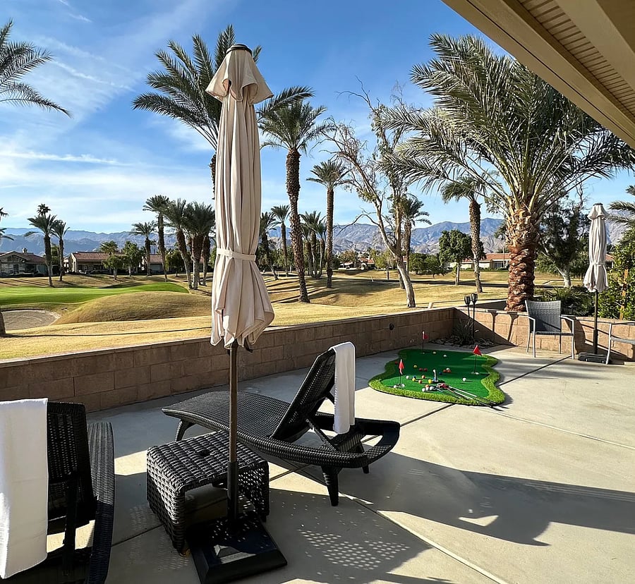 Entertain in style with multiple seating areas, a putting green, and endless California sunshine.