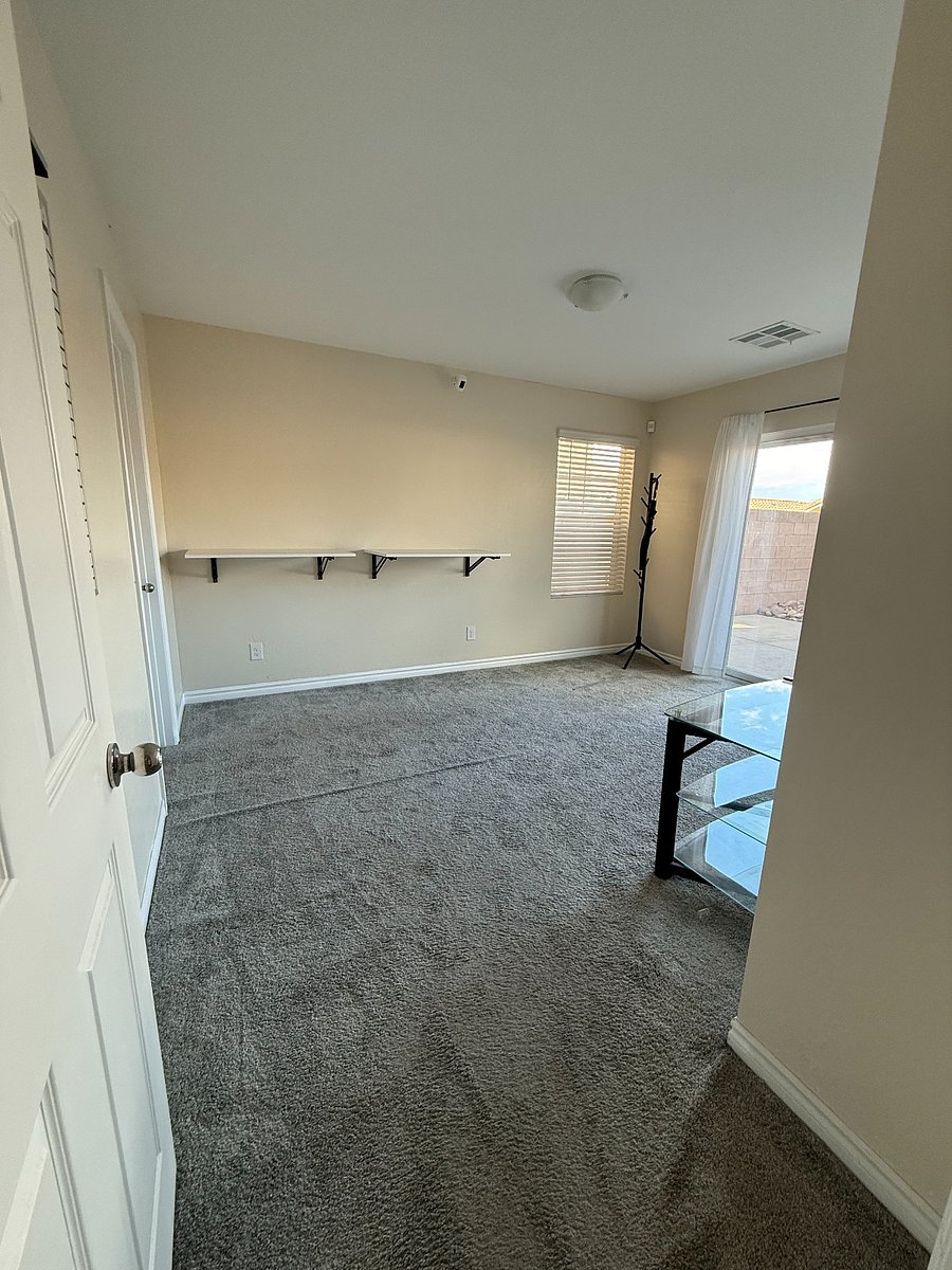 1st Floor Living Room (Sectional and Larger TV Coming Soon!)