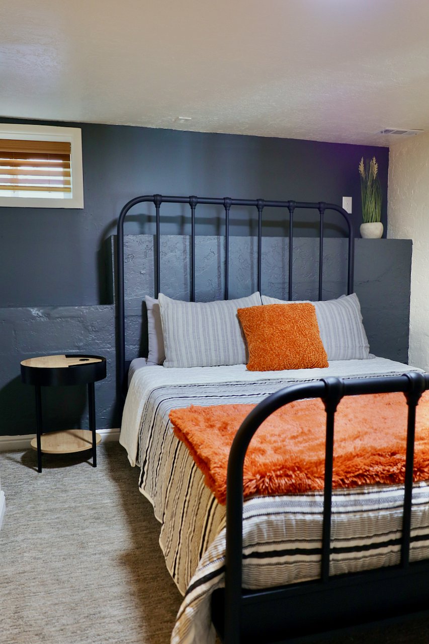 Cozy second bedroom with queen bed.