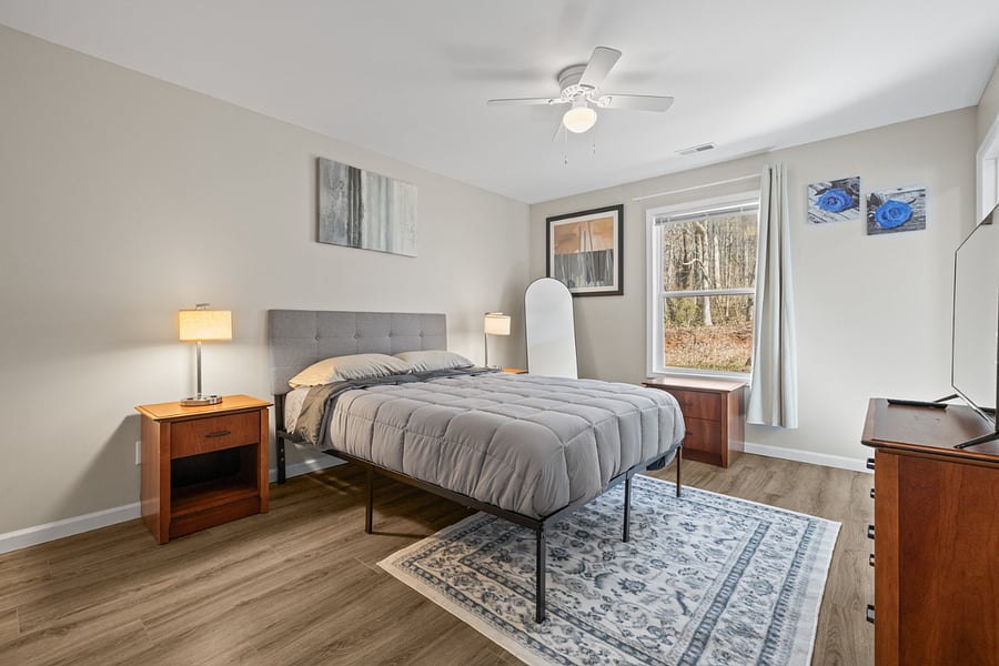 Spacious Master Bedroom with Full Length Mirror and Blackout Curtains