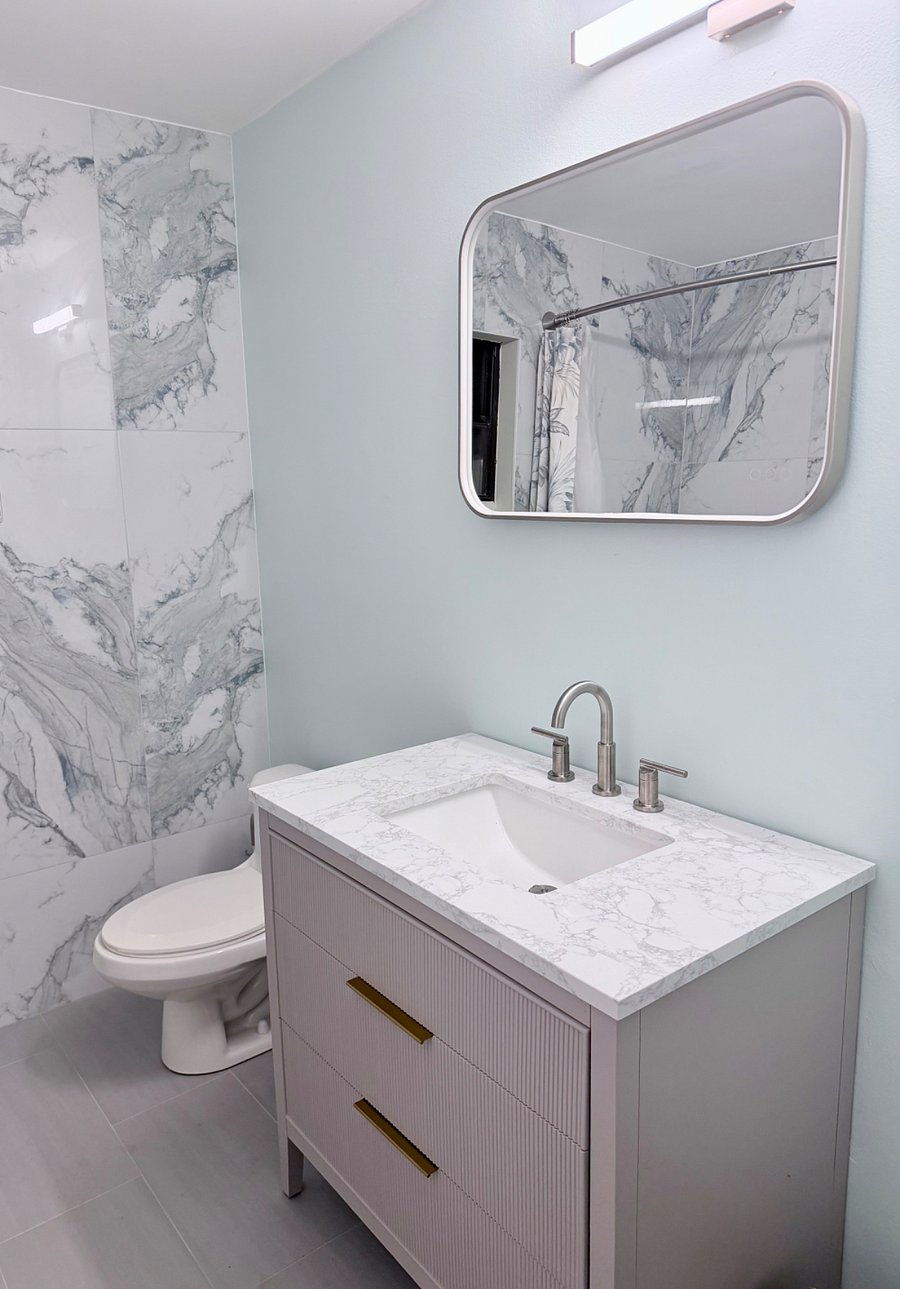 Guest bathroom with new soaking bathtub.