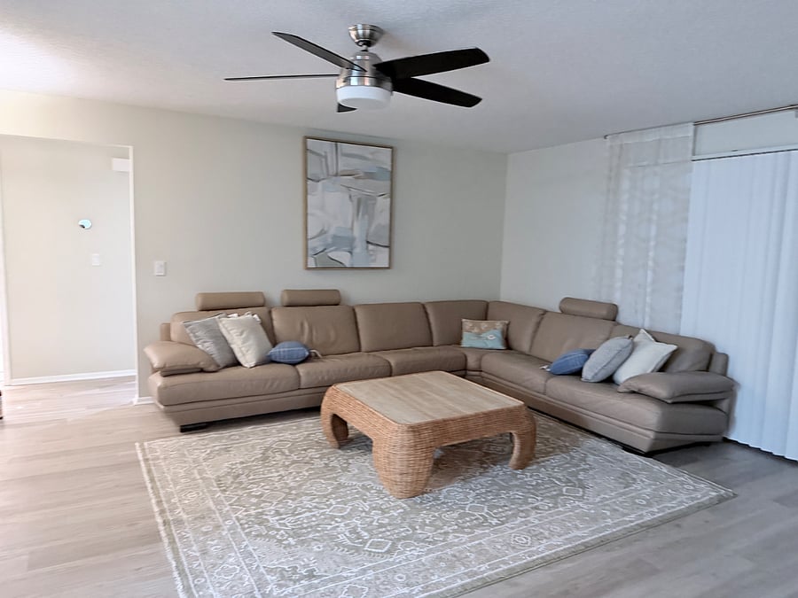 Living room with comfortable leather sofa.