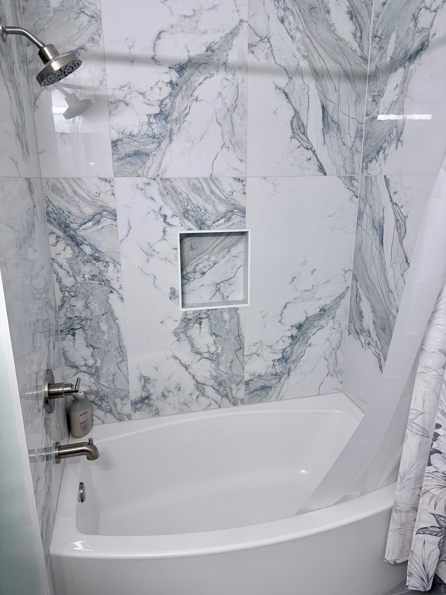 Guest bathroom with a comfortable soaking tub.
