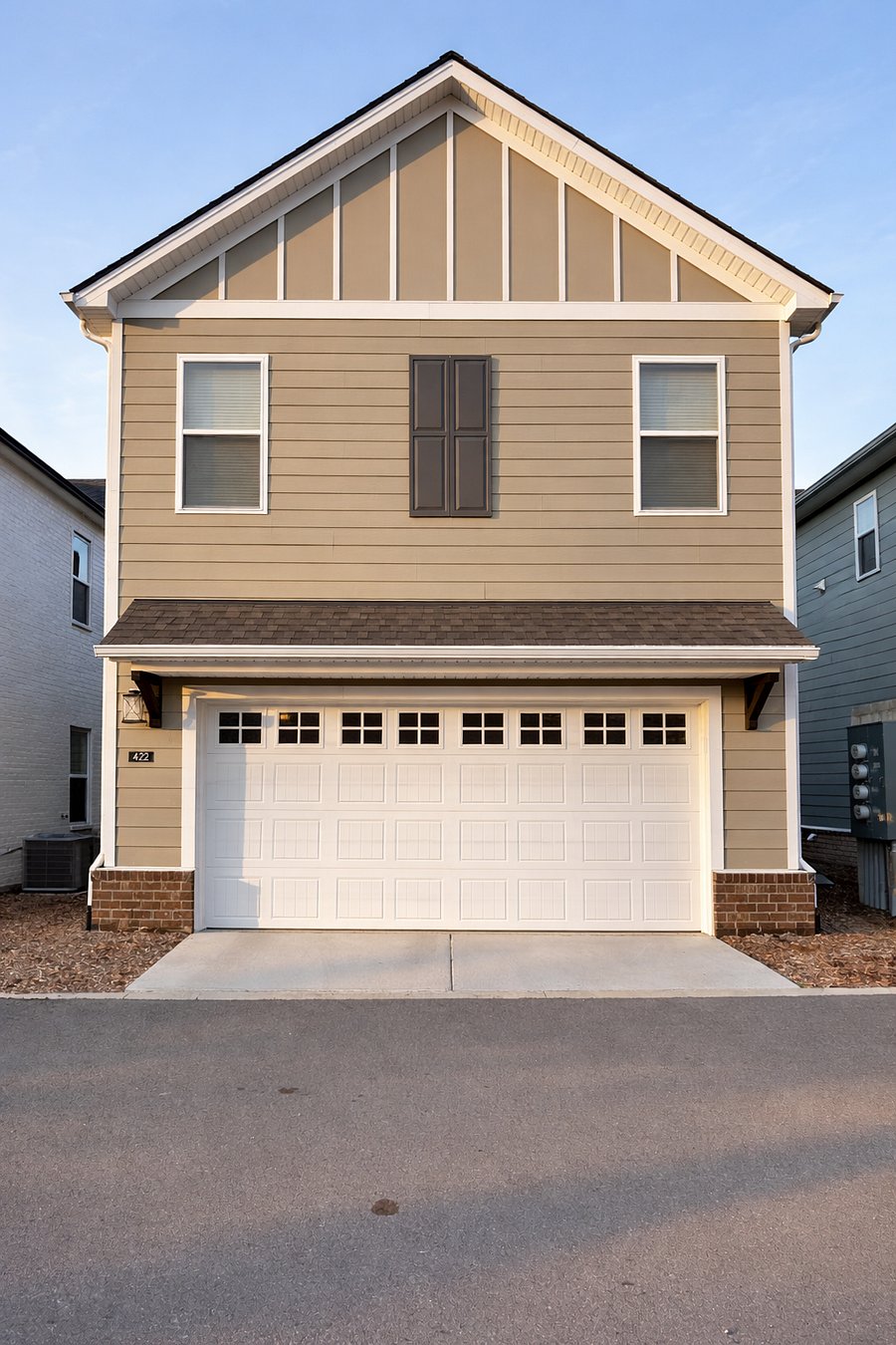 2 car garage with storage areas