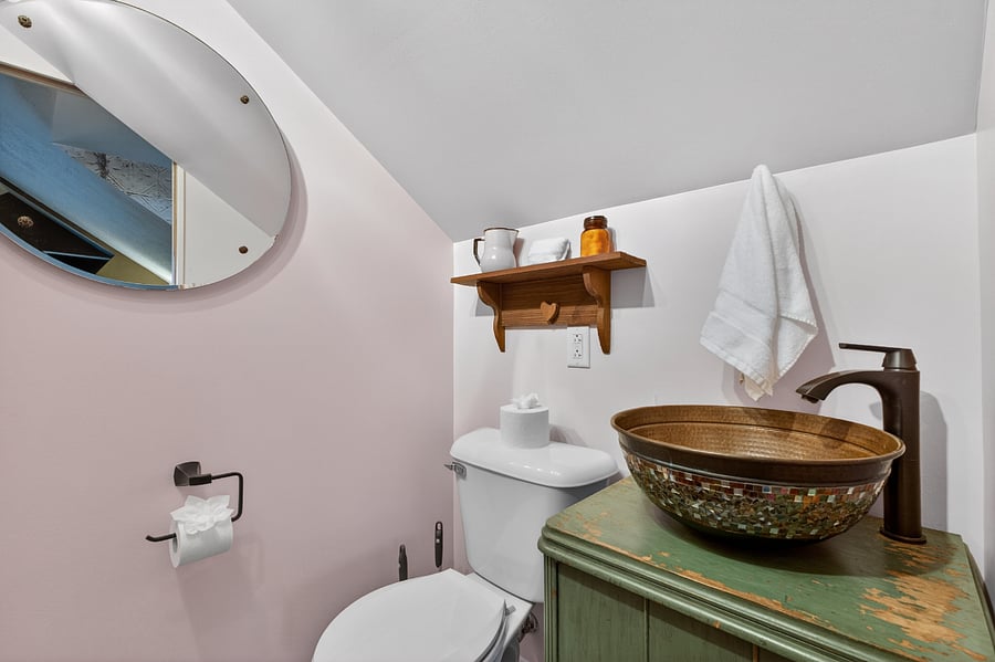 1/2 bath located upstairs