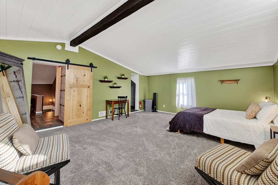 This is a loft bedroom. 