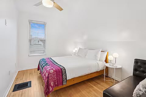 Bedroom 2 with one (1) queen-size bed and chaise lounge