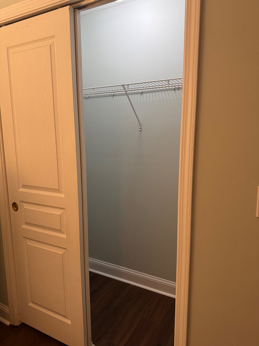 Closet with sliding doors. (Shelving options are available)