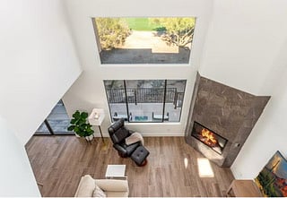40 foot ceilings make this catwalk view a wall of windows overlooking Troon North 9th fairway.