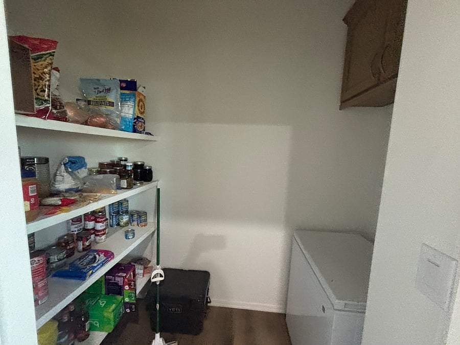 pantry with extra freezer