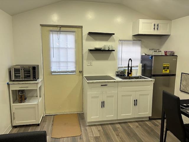 KITCHEN WITH COOKTOP AND MICROWAVE AIR FRYER COMBO