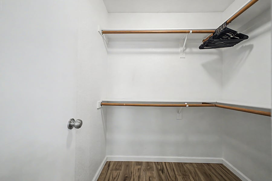 Primary bedroom closet, walk-in.