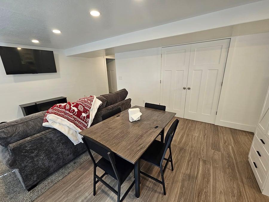 Behind the french doors is the homes Furnace, AC, Water heater and electrical. Ceaning supplies are on a shelf in the furnace room. Cleaning supplies such as, Broom and Dust Pan, Cordless Vacuum, Mop, Toilet Bowl cleaning supplies, etc. Pull to open.
