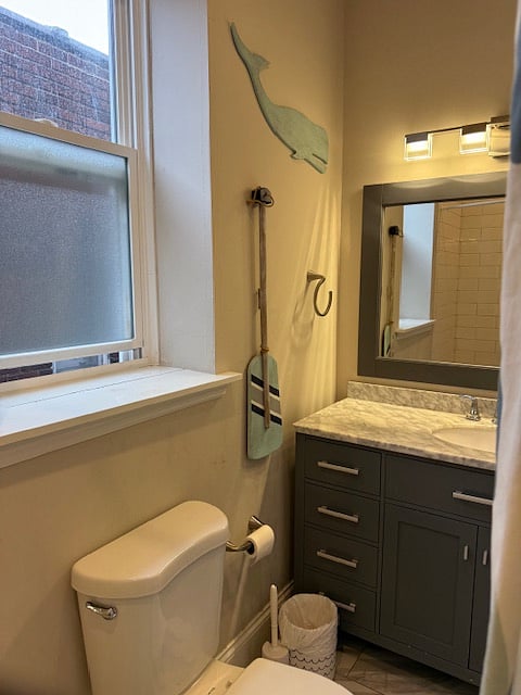 Upstairs bathroom in main upper hallway