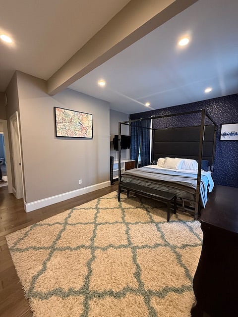 Main room bed and TV