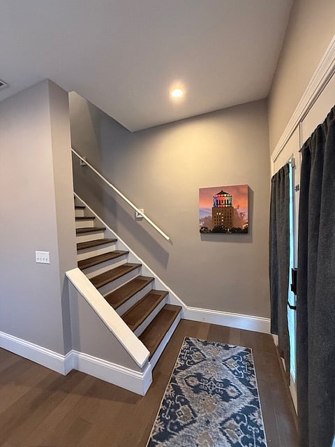 Front door and stairs to upper level