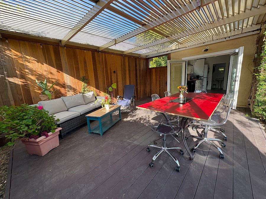 Outdoor dining and living room deck. Roof opens and closes.