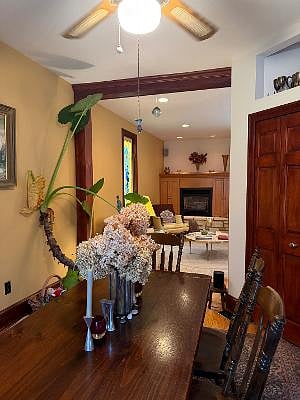 adjoining dining room great for sharing meals or playing games (note--plants are inside for winter)