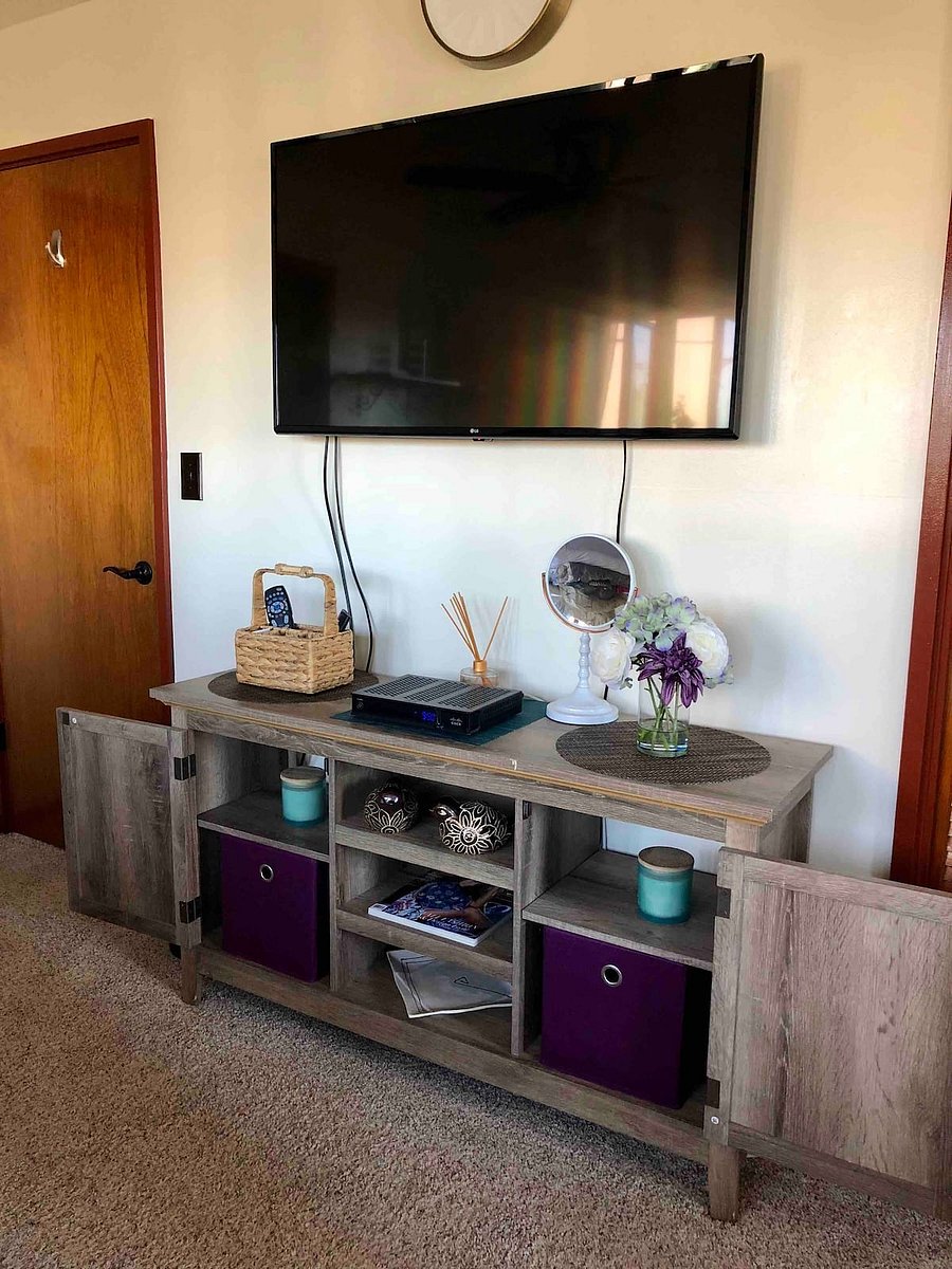 We have plenty of room for you to unpack your clothes, provide a make-up mirror and (sponges, cotton balls/pads). The TV is a Smart TV to make gaming, streaming or video conferencing a breeze.