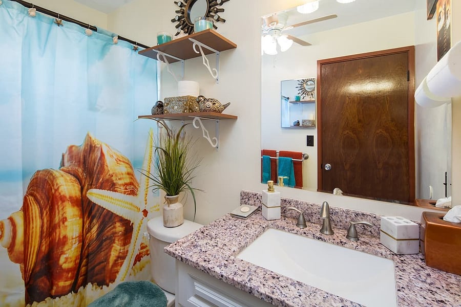 Attached bathroom (shower/tub) combo stocked with plenty of bath linens & toiletries (2 weeks' worth).