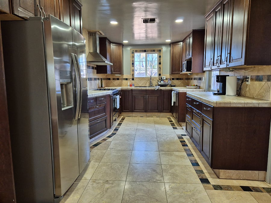 Spacious kitchen with assigned cabinet and fridge space. Fully equipped with cookware, dishware, seasonings, cooking oil, etc.