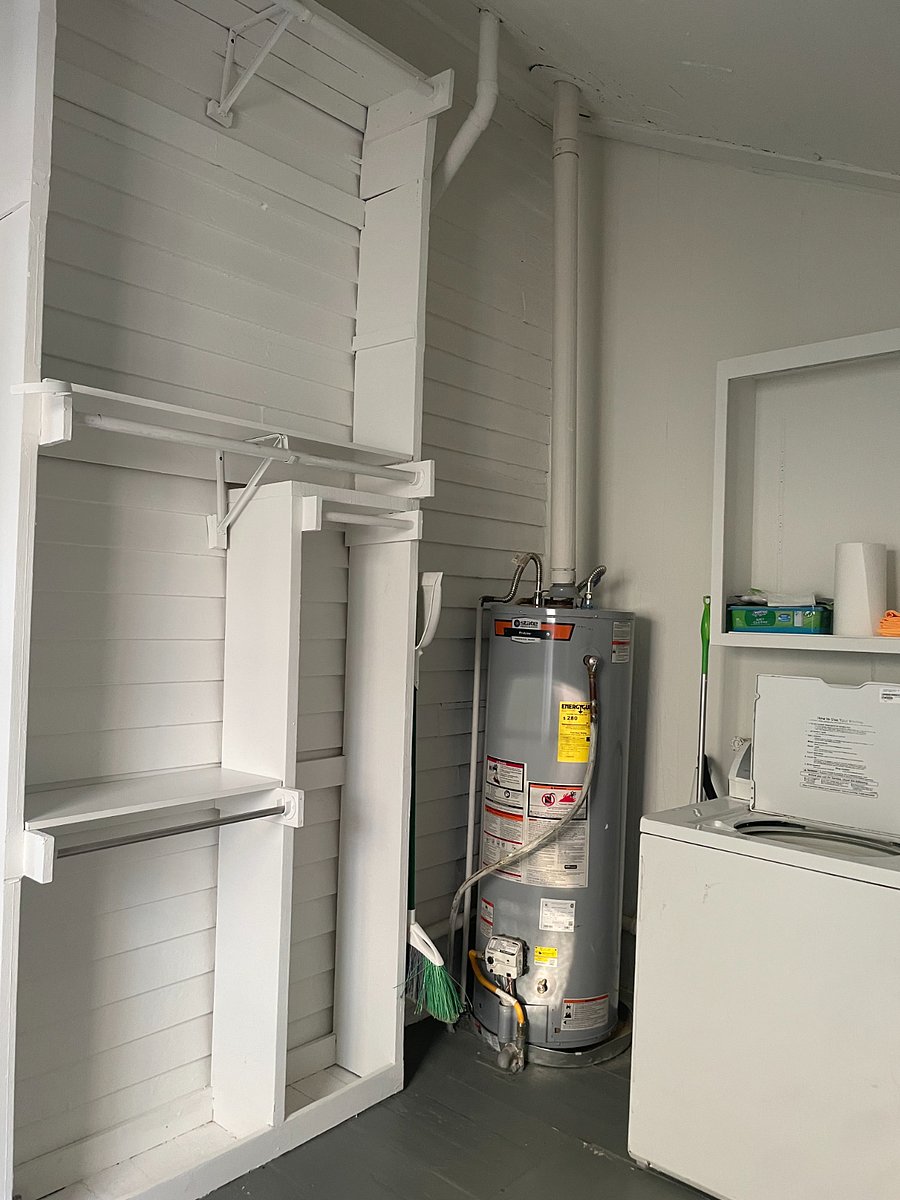 Gas hot water heater and full sized washer and dryer
