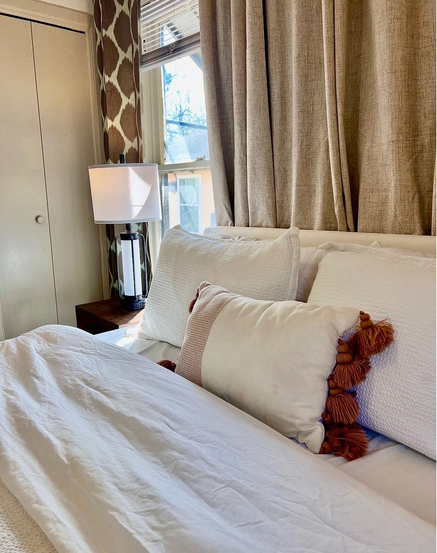 Bedroom: Queen size bed, smart TV and black out curtains