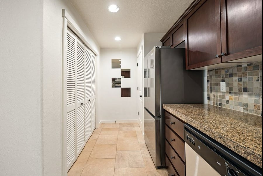 Full kitchen with newer GE stainless appliances. Plus pantry and convenient in-unit washer and dryer for your clothes.