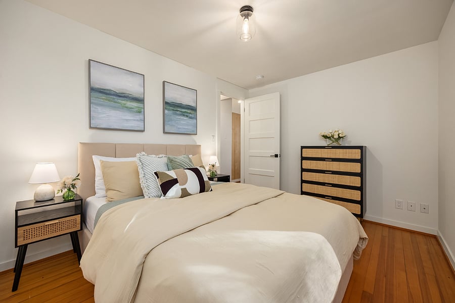 West facing Bedroom with queen bed and closet. Queen bed lifts up for additional storage.