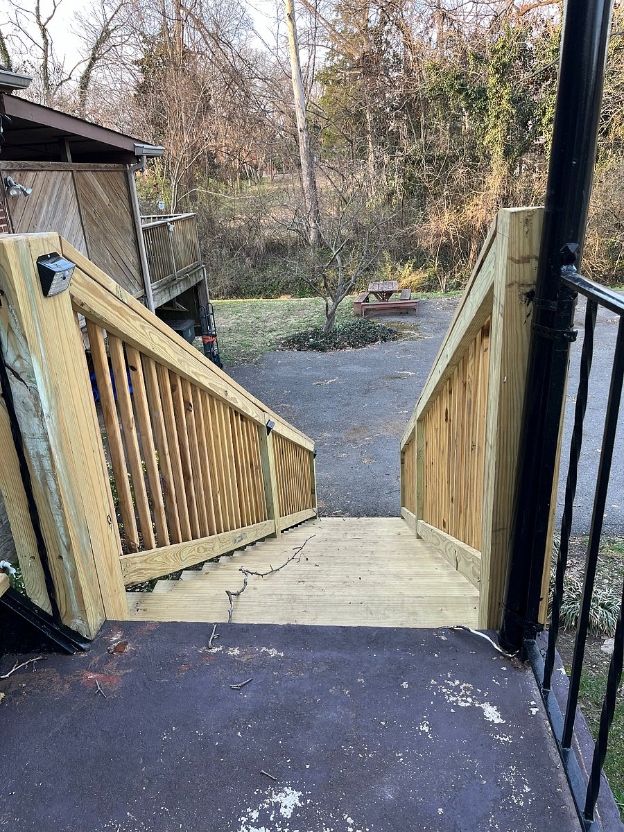 Stairs to drive and backyard