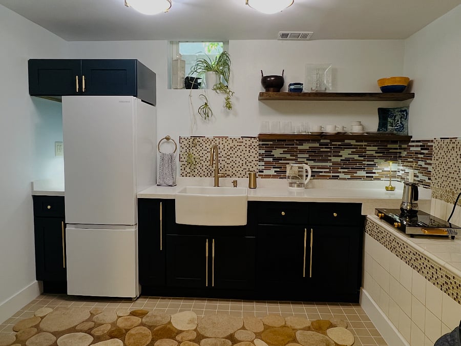 Farmer Sink, Full Sized Refrigerator with Charging Station to left