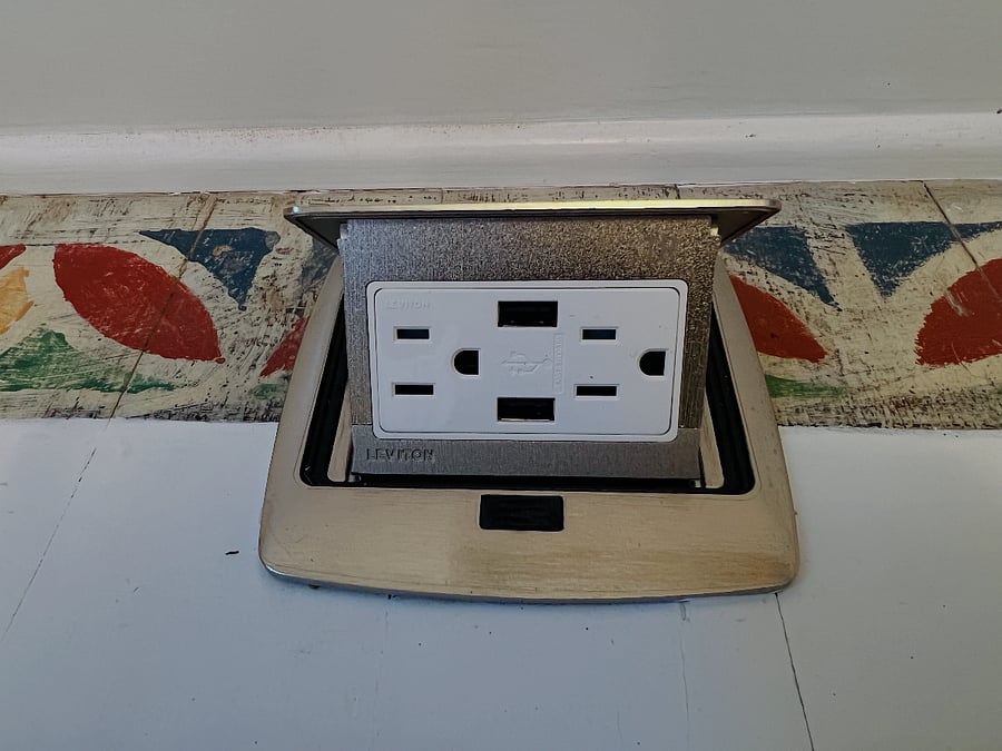 Pop-up Floor Socket and Charging Receptacle in Office.
