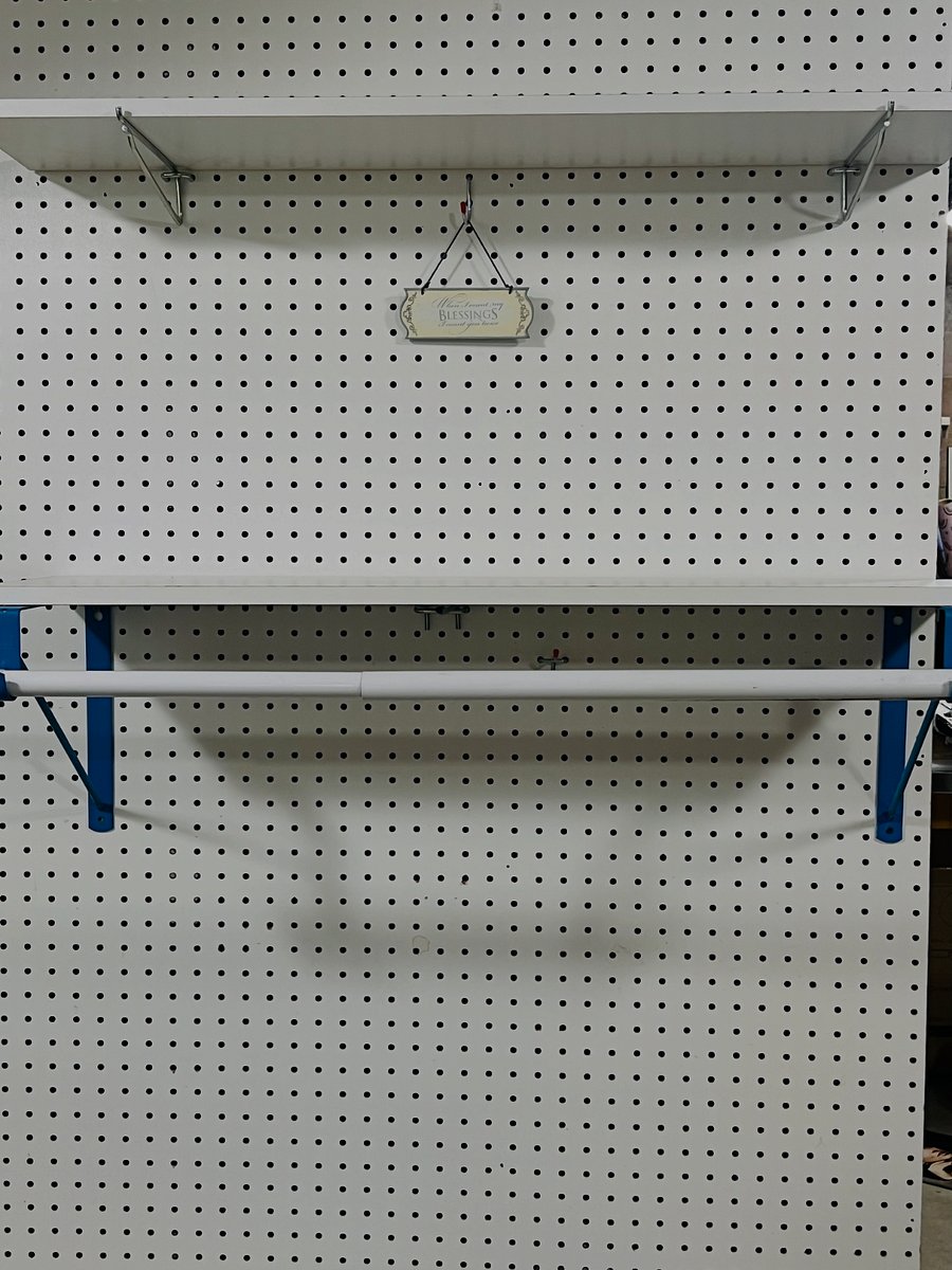 Shelving and Clothes Pole in Laundry Area