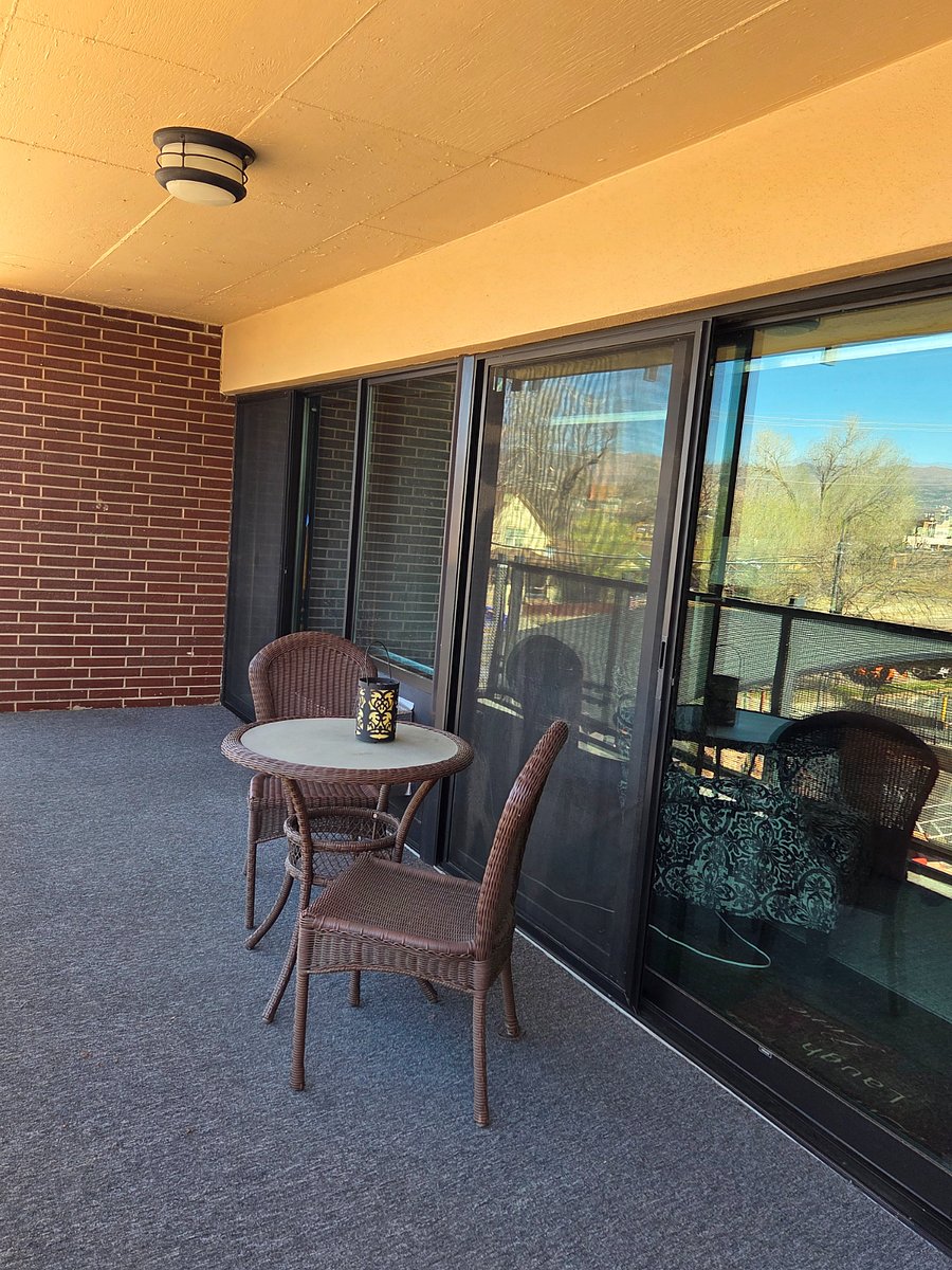 Have your coffee under the covered balcony with tree coverage. 
