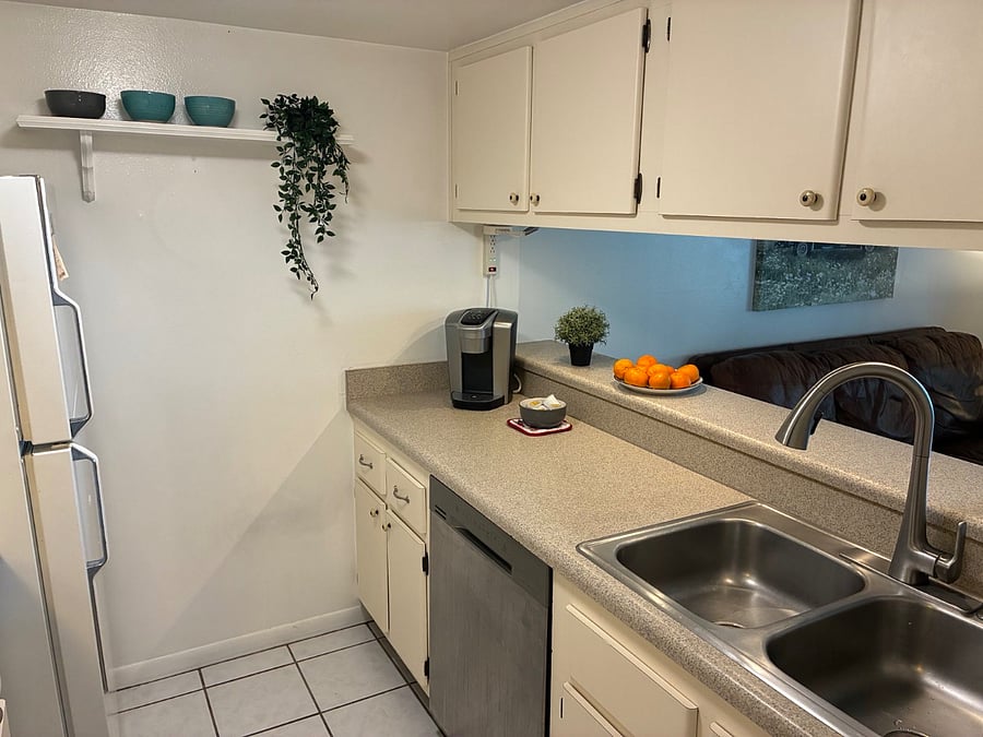Kitchen with dishwasher, cabinets, Keurig Coffee maker