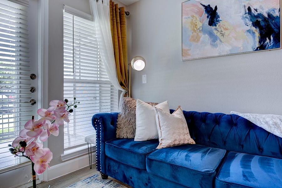 Spacious and comfortable living room with Smart TV and relaxing seating, perfect for unwinding after long shifts.