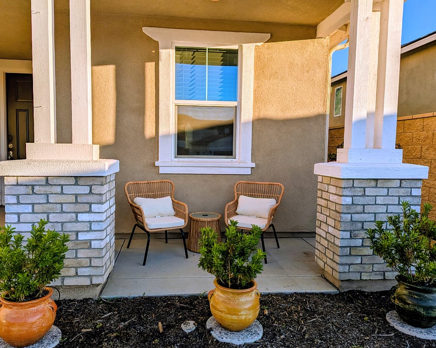 Comfy seating on front patio in front of apartment, with perfect views of the sunset.