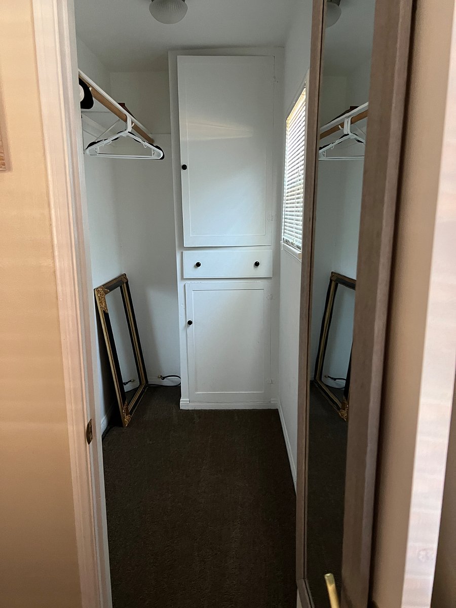 Walk in closet in King bedroom