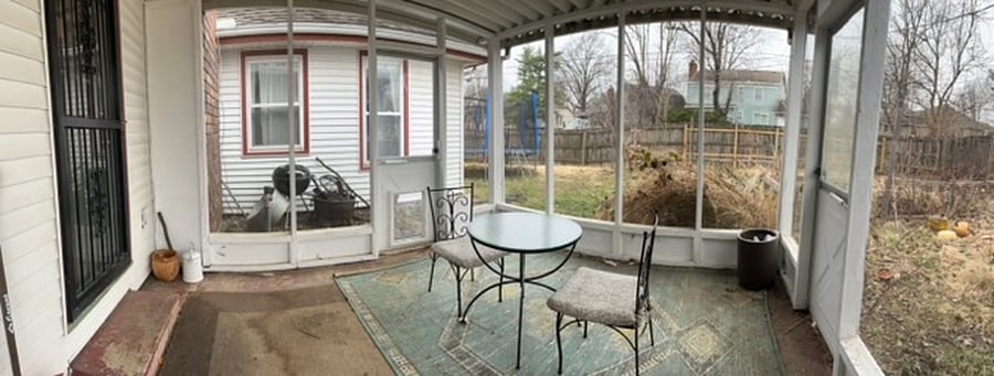 Back screened in patio.