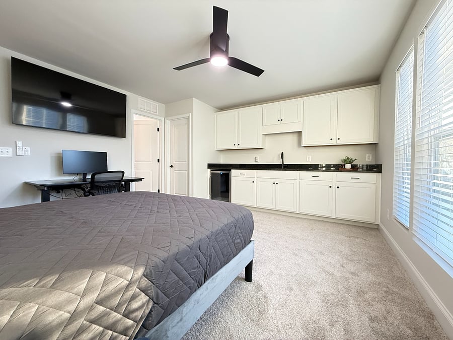 Effortless living with a private walk-in closet and dedicated kitchenette space.