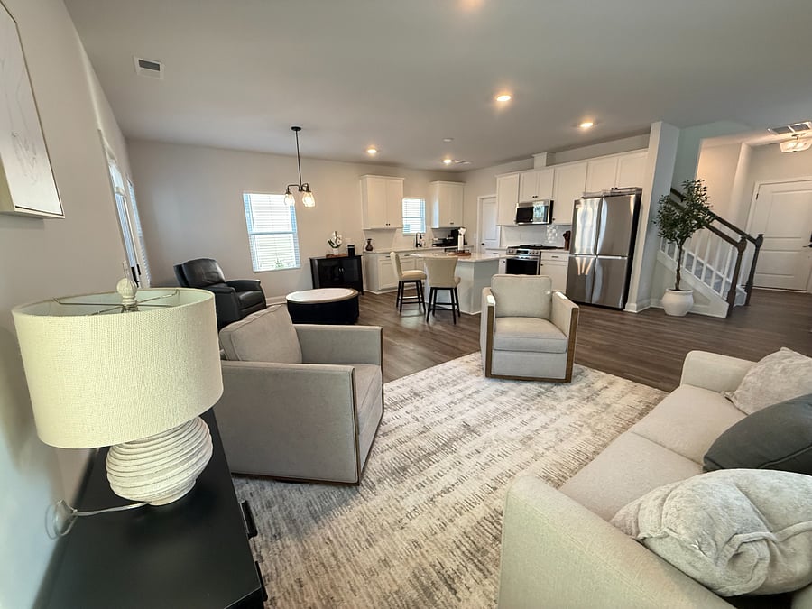 Beautiful, modern common areas with marble-style island and stainless-steel appliances.