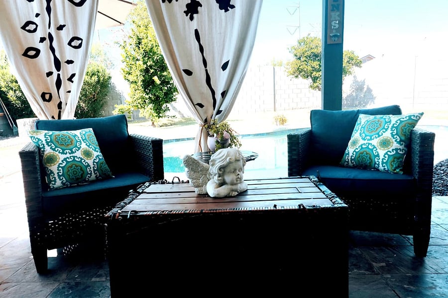  Plenty of patio curtains to shade the patio! Enjoy the citrus tree's when in season! lemon & orange