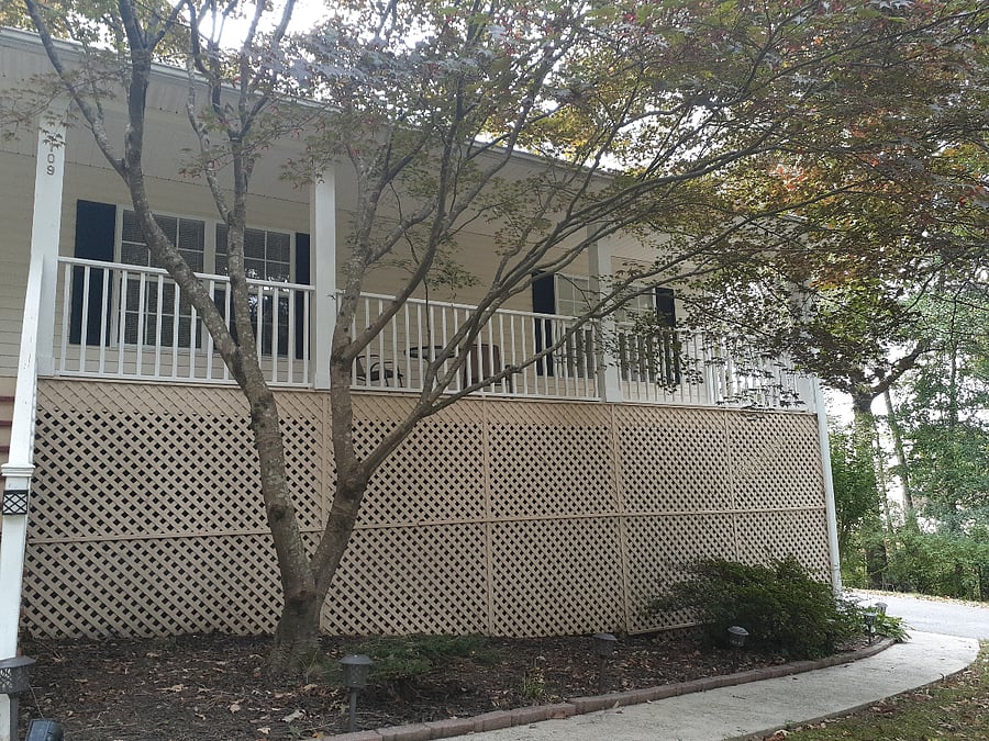 Front view of the house and its cozy porch.