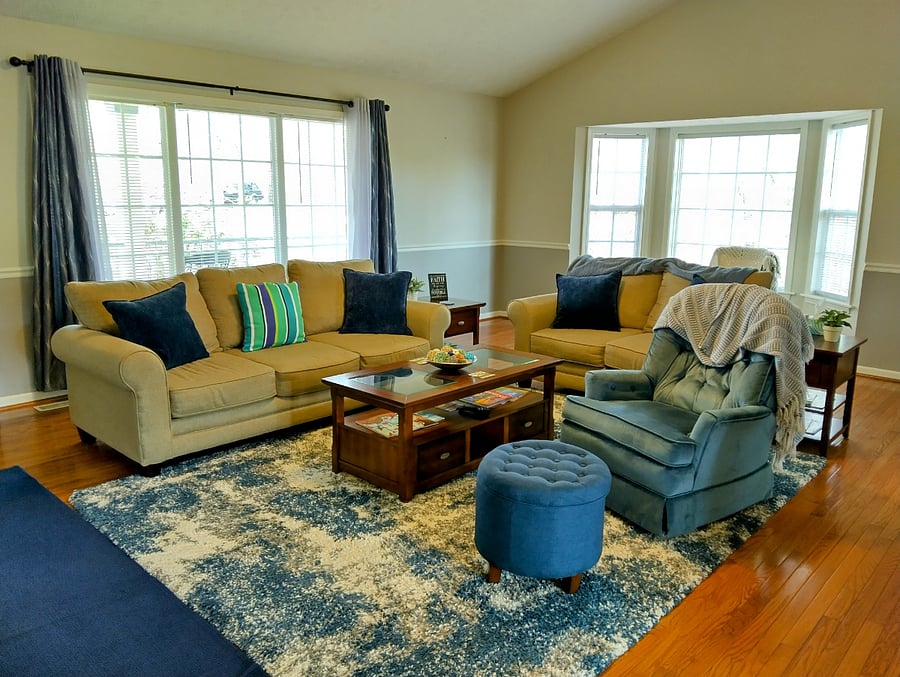 The living room provides a comfortable restful area as you unwind from your day. 