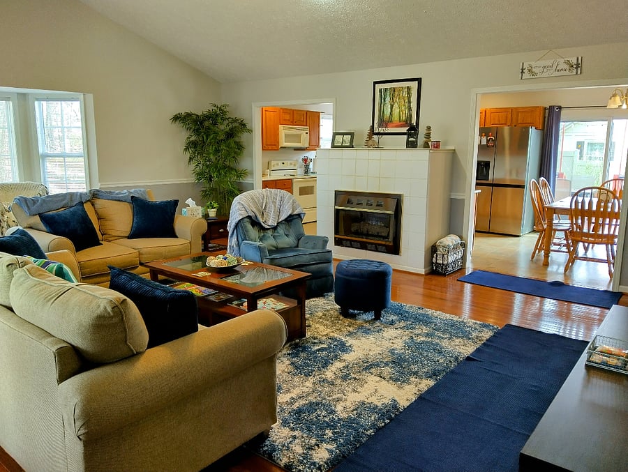 The living room provides a comfortable, restful space, perfect for unwinding and relaxing after a long day. 