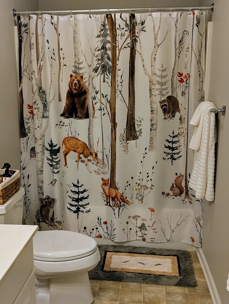 The secondary bathroom is spacious and features two sinks.