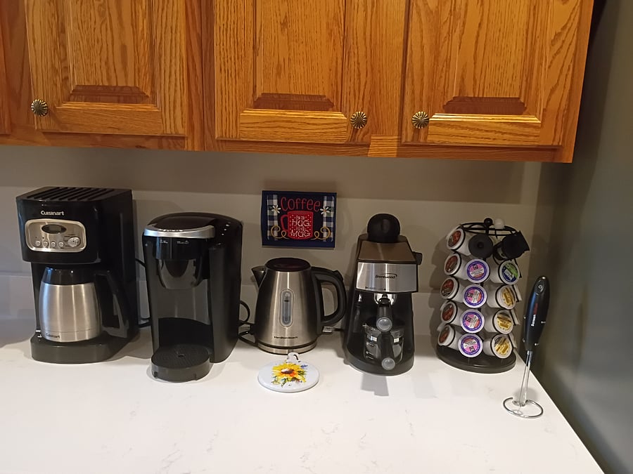 The coffee and tea bar provides several options for making your favorite drinks. K-pods and tea bags are provided as a starter.