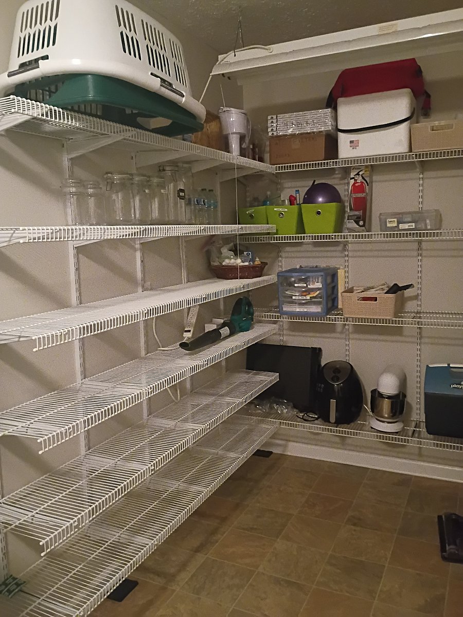 The pantry and laundry are combined in one convenient room, making everything easy to access.